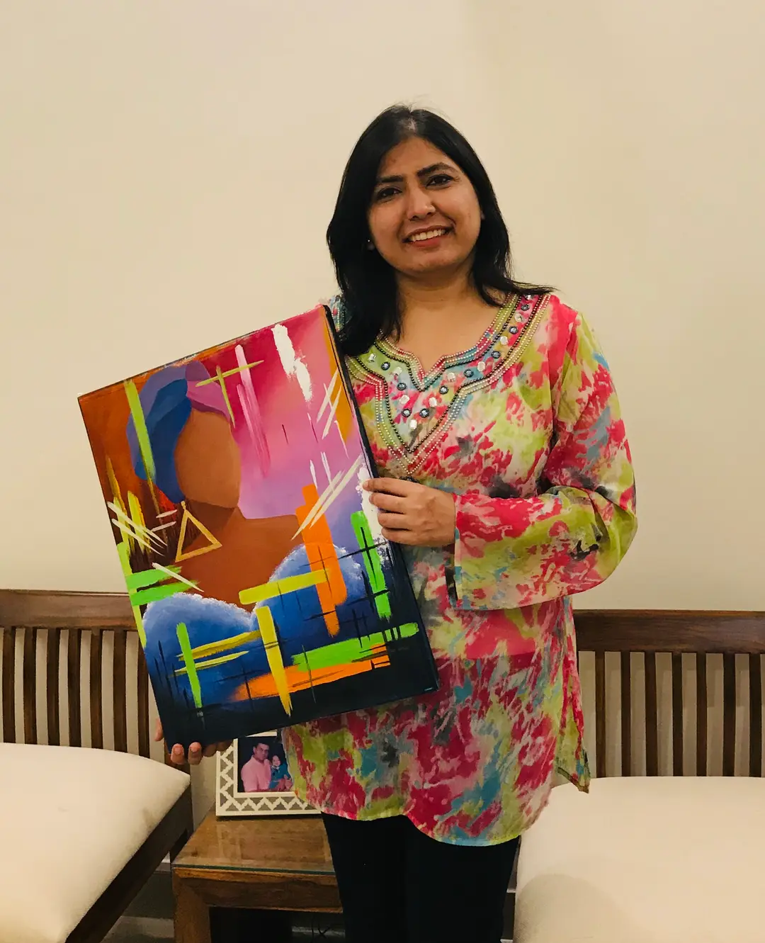 Rakhi Vashisht presenting her paintings